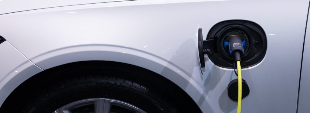 PHEV Plug-in Hybrid vehicle charging. Stock photo from Pexels.