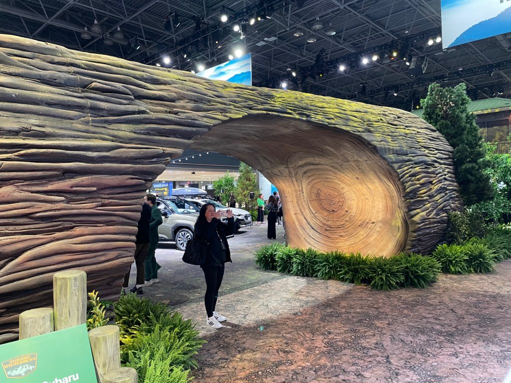 Walking through a fallen (plastic!) Giant Sequoia